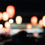 Blurred red and yellow lanterns at night